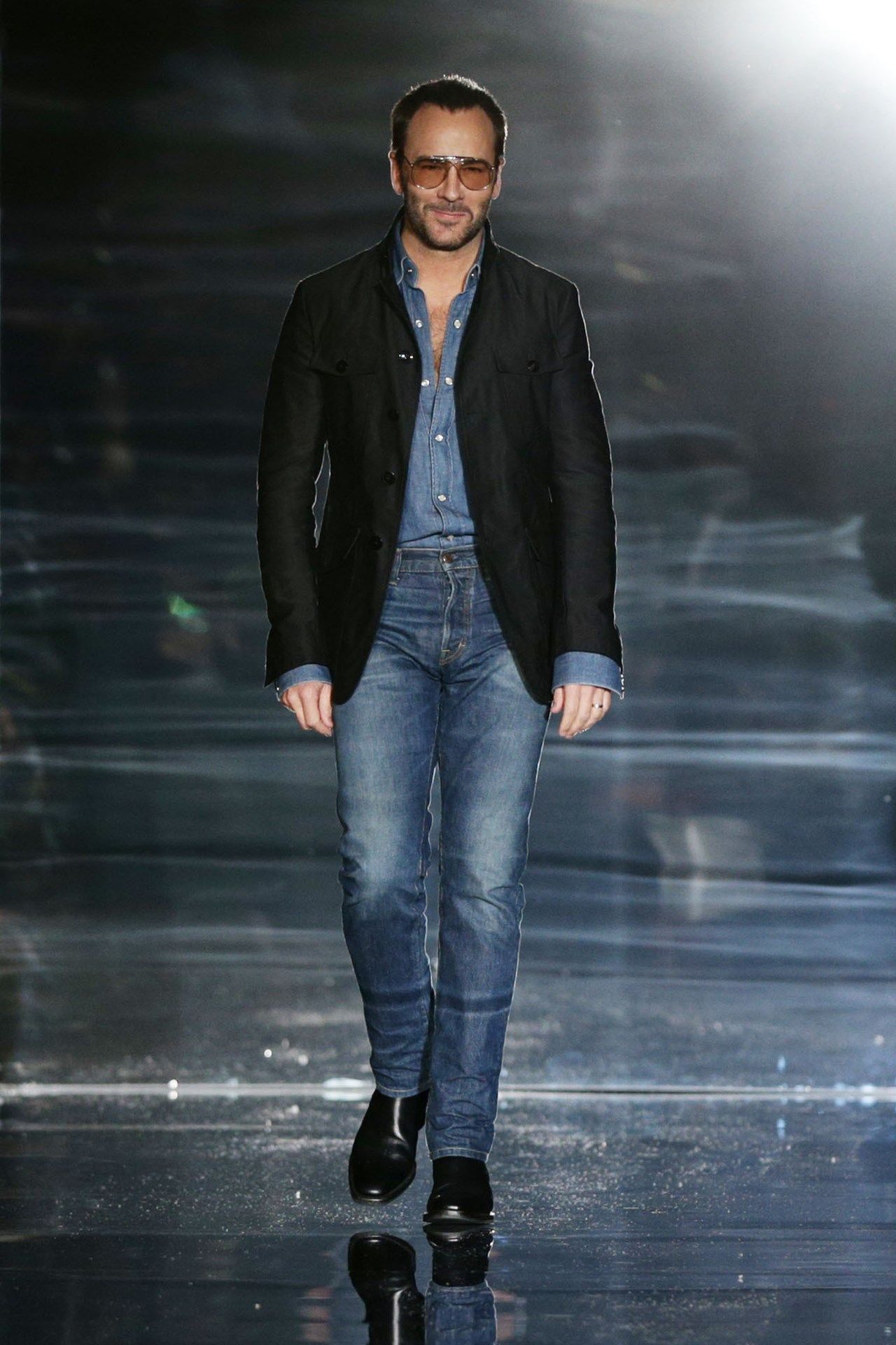 Tom Ford in a blazer, canadian tuxedo, and chelsea boots.
